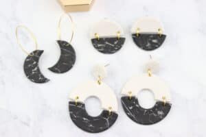 black and white marbled polymer clay earrings with gold jump rings and gold hoops