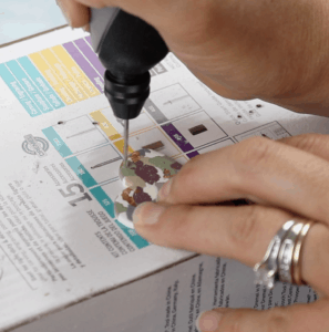 drilling holes in polymer clay earrings with dremel tool